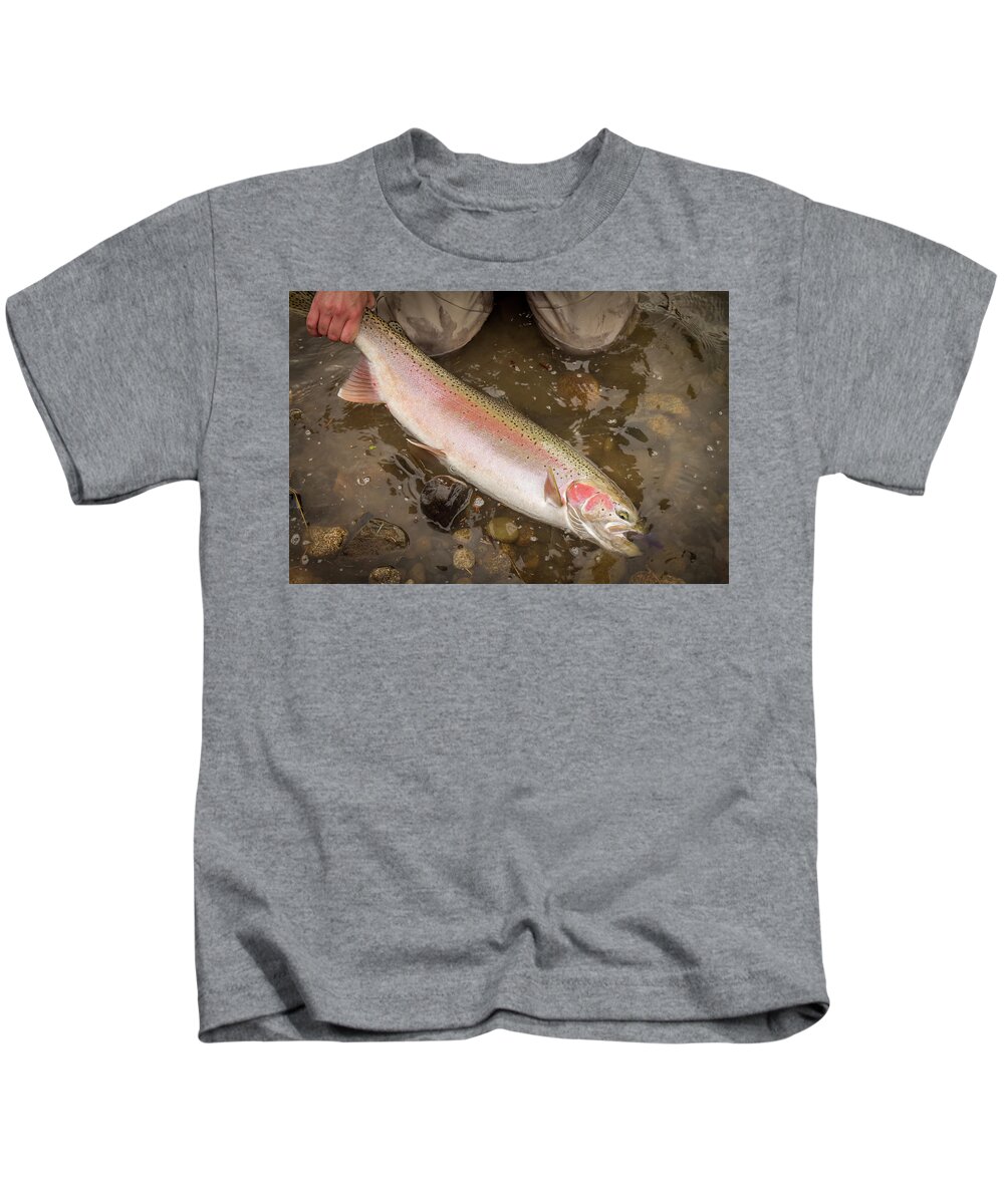 A beautiful fish, a spring steelhead, rainbow trout, caught on a fly by a  fishermen. Kids T-Shirt by Snap-T Photography - Fine Art America