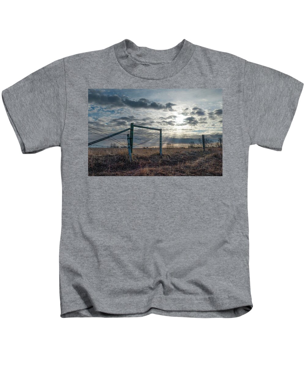 Alberta Kids T-Shirt featuring the photograph Alberta sky and fence line by Karen Rispin