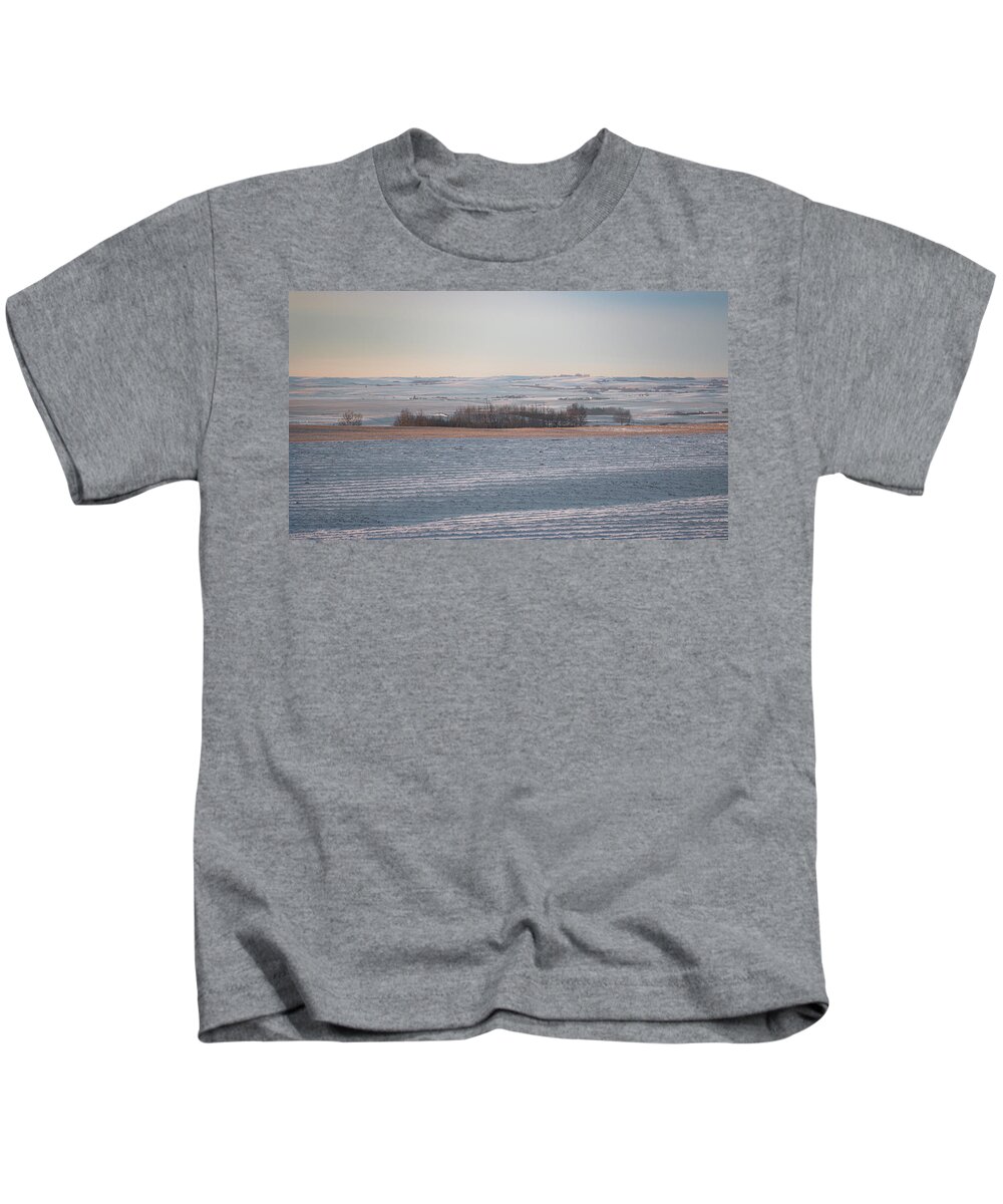 Agriculture Kids T-Shirt featuring the photograph Alberta winter wheat farm landscape by Karen Rispin