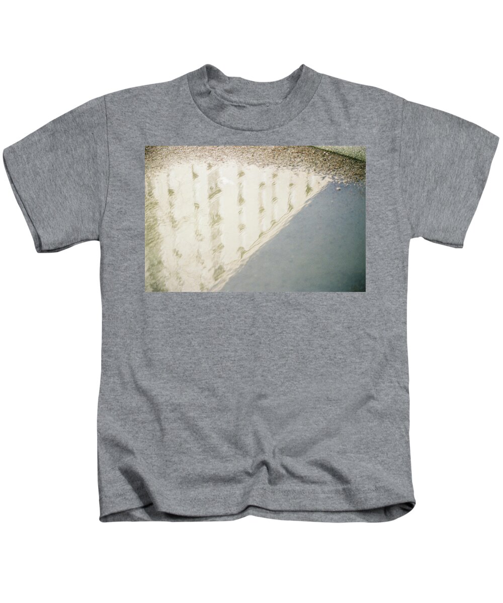 Water Kids T-Shirt featuring the photograph Building reflection by Barthelemy De Mazenod