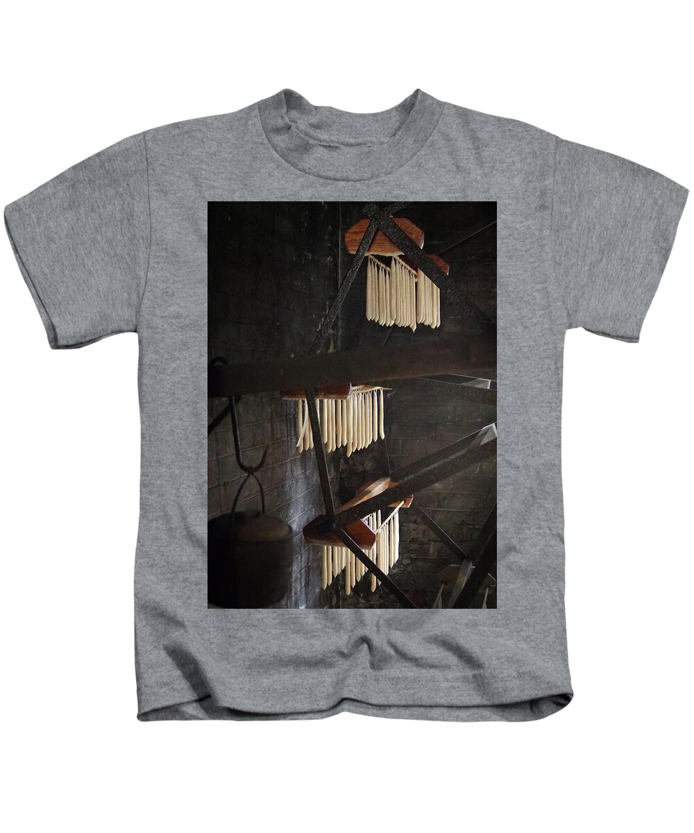 Candles Kids T-Shirt featuring the photograph Hanging candles by Average Images