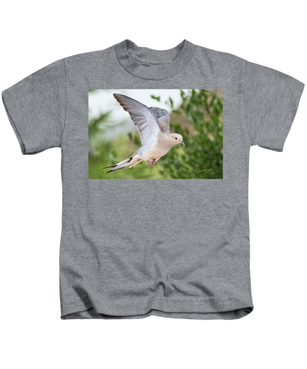 Dove Kids T-Shirt featuring the photograph Dove in Flight by Dan McGeorge
