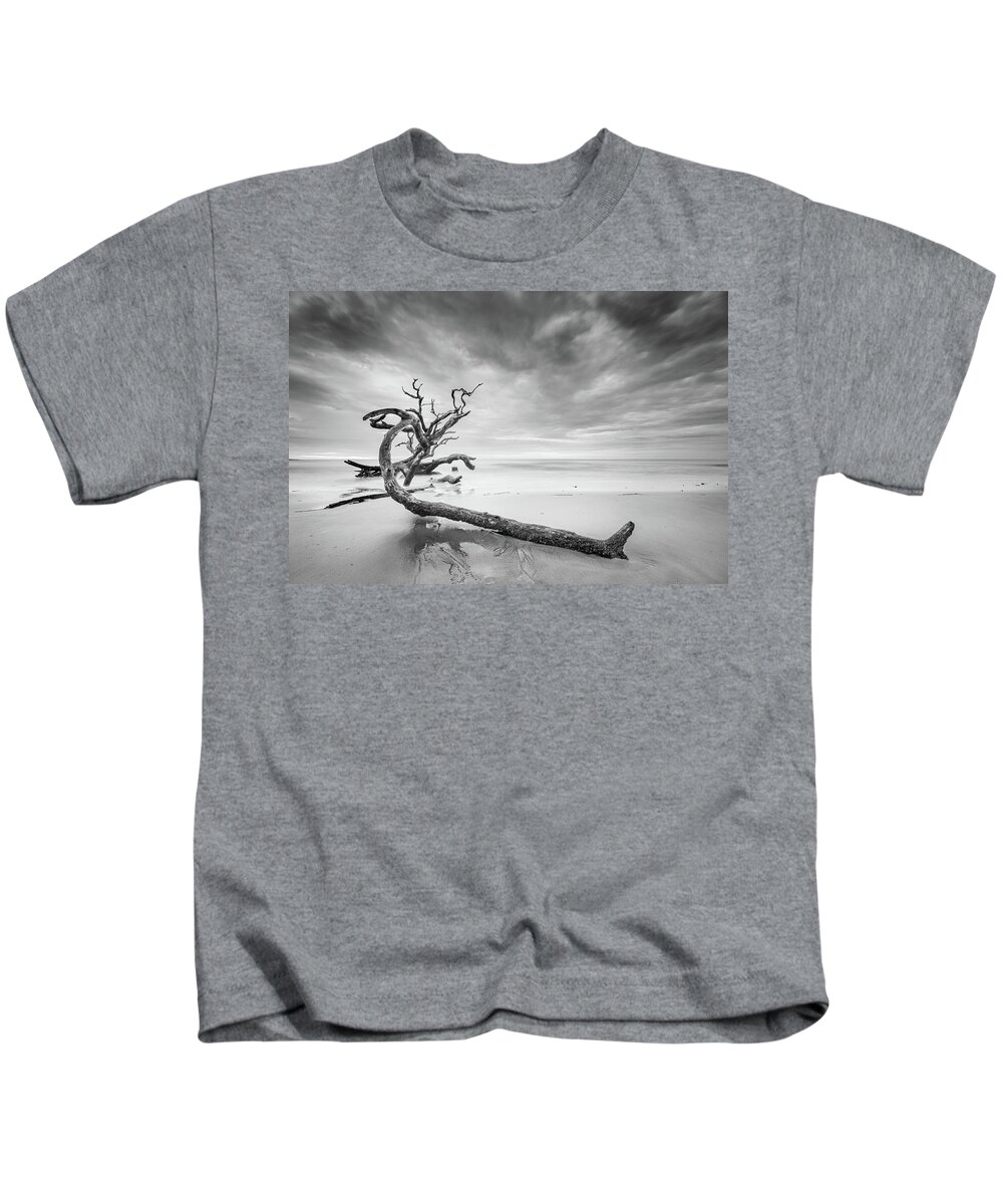 Driftwood Beach Kids T-Shirt featuring the photograph Driftwood In Black And White by Jordan Hill