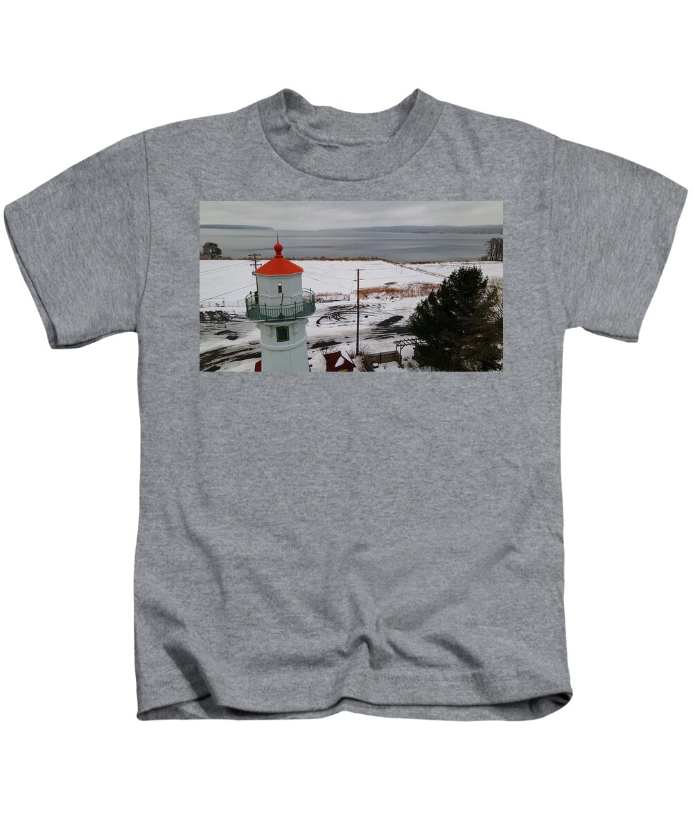Lighthouse Kids T-Shirt featuring the photograph Grand Island Harbor Lighthouse in Munising Michigan during winter by Eldon McGraw