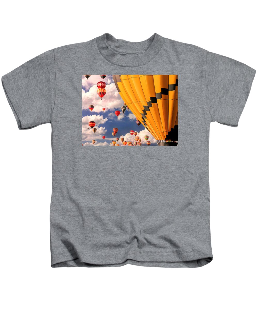 Albuquerque Balloon Fiesta Kids T-Shirt featuring the mixed media Mass Ascension by Rebecca Herranen