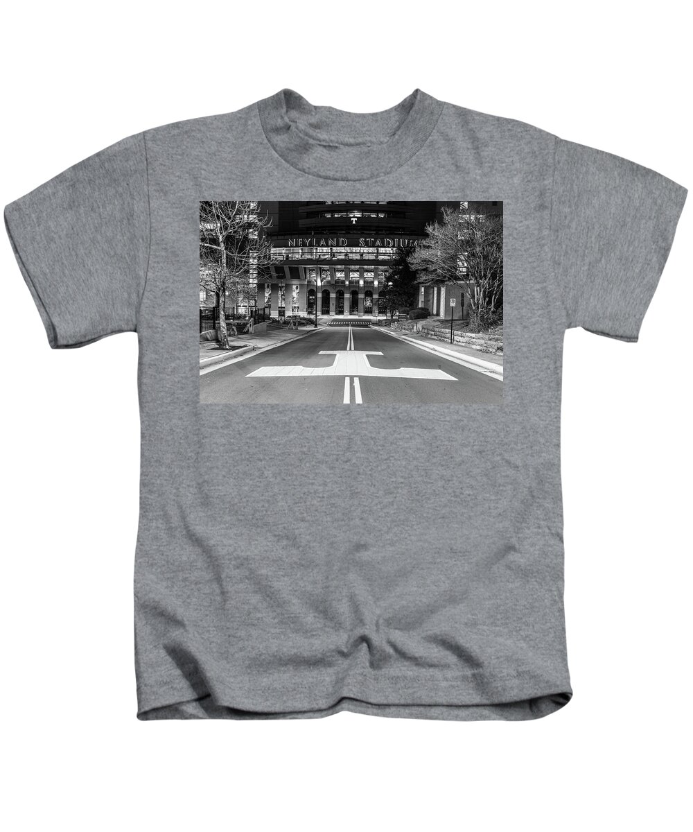 University Of Tennessee At Night Kids T-Shirt featuring the photograph Neyland Stadium at the University of Tennessee at night in black and white by Eldon McGraw