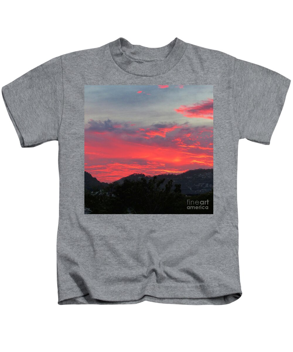 Blazing Red Sky Kids T-Shirt featuring the photograph Red Sky Over Zihuatanejo by Rosanne Licciardi