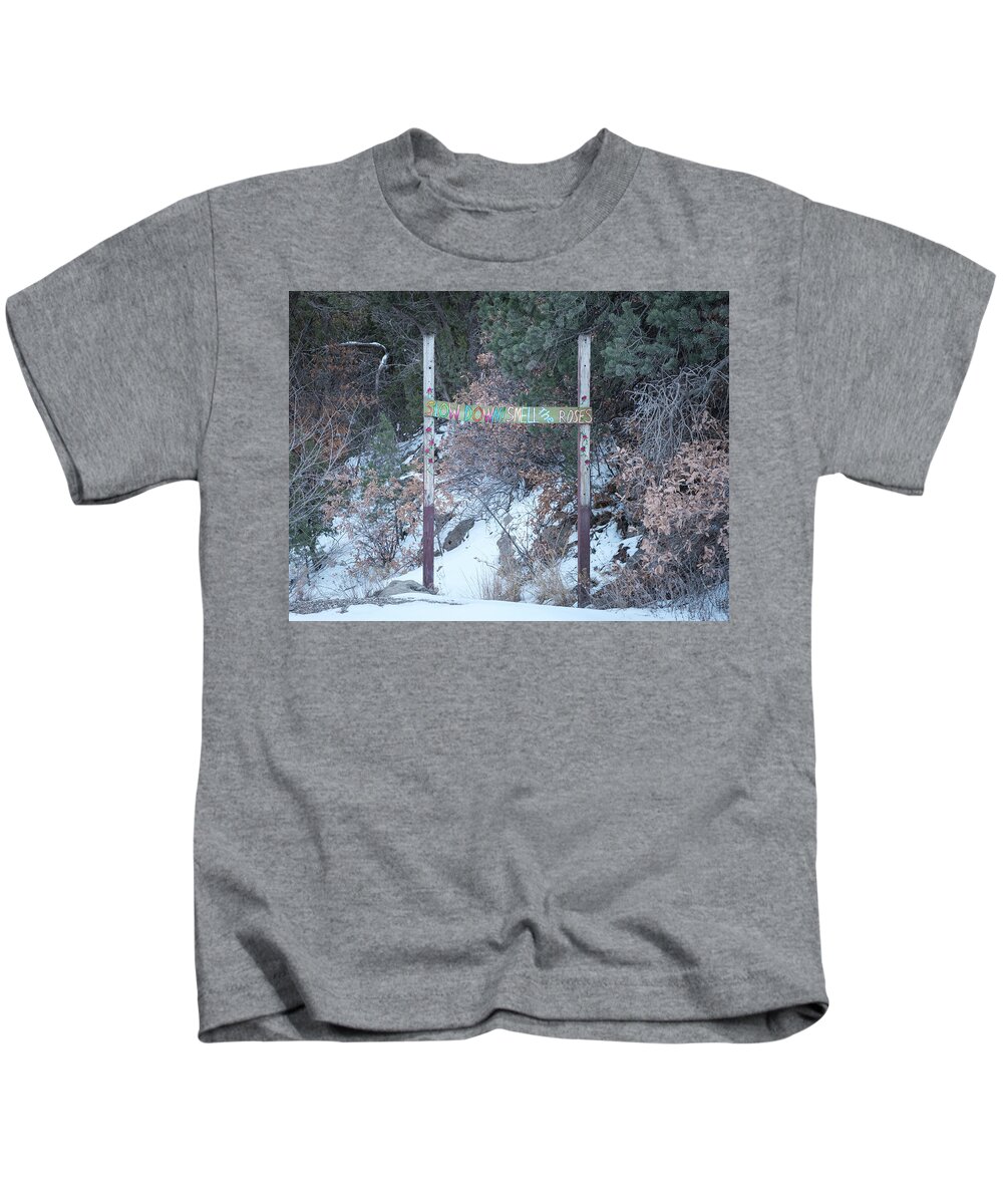 Sign Kids T-Shirt featuring the photograph Slow Down and Smell the Roses by Mary Lee Dereske