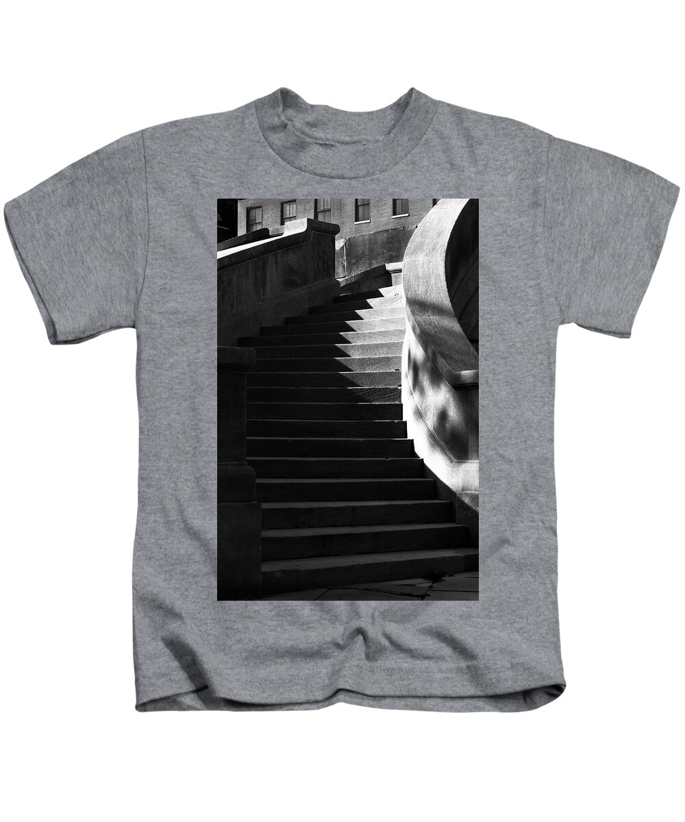 Architecture Kids T-Shirt featuring the photograph Spiral stairs and shadows by Charles Floyd