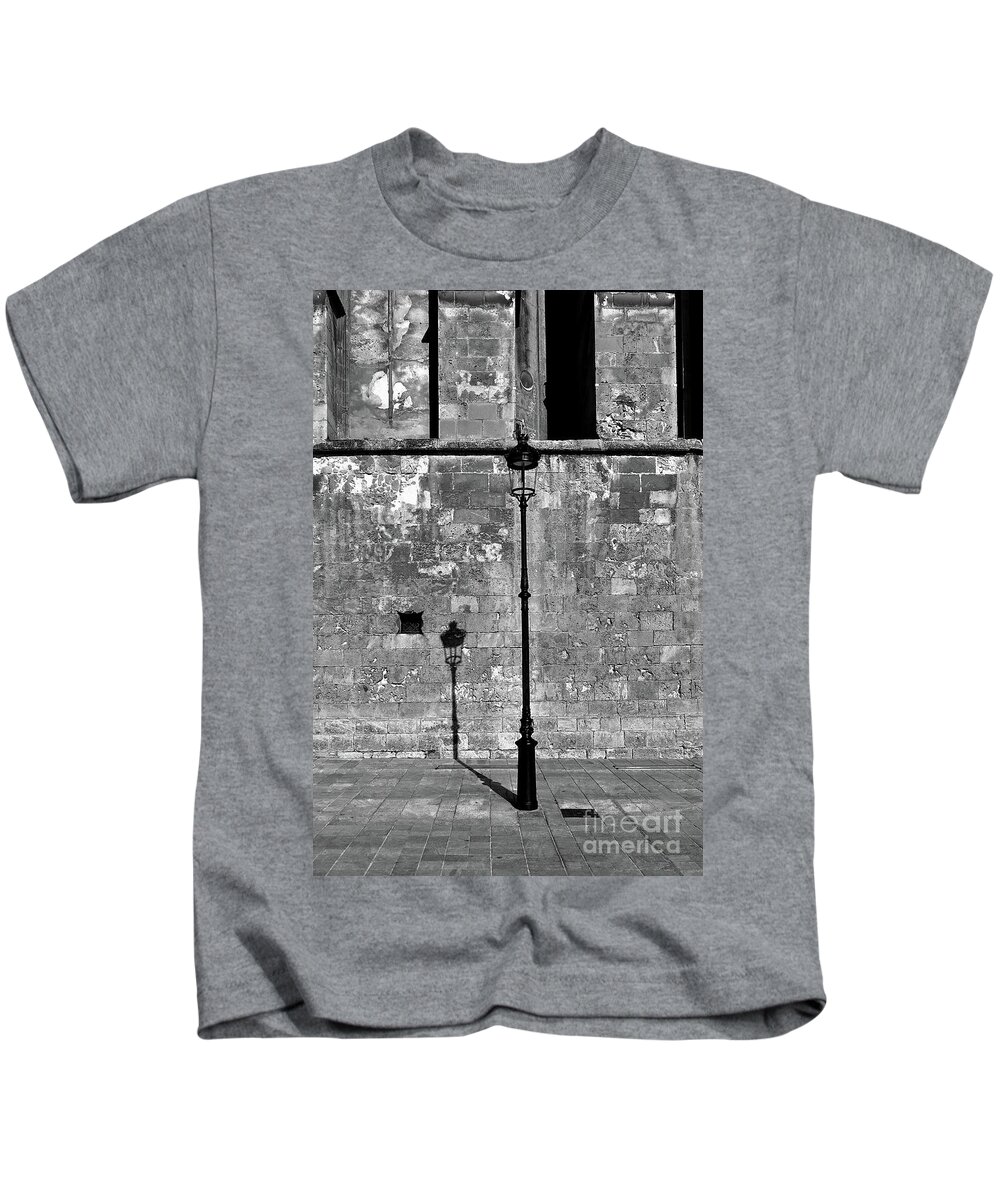 Black And White Kids T-Shirt featuring the photograph Street Lamp And Its Shadow by Elisabeth Derichs