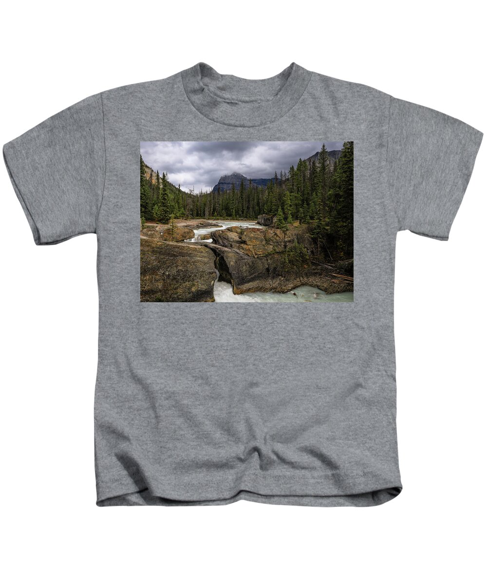 Kicking Horse River Kids T-Shirt featuring the photograph Yoho Natural Bridge by Dan Sproul