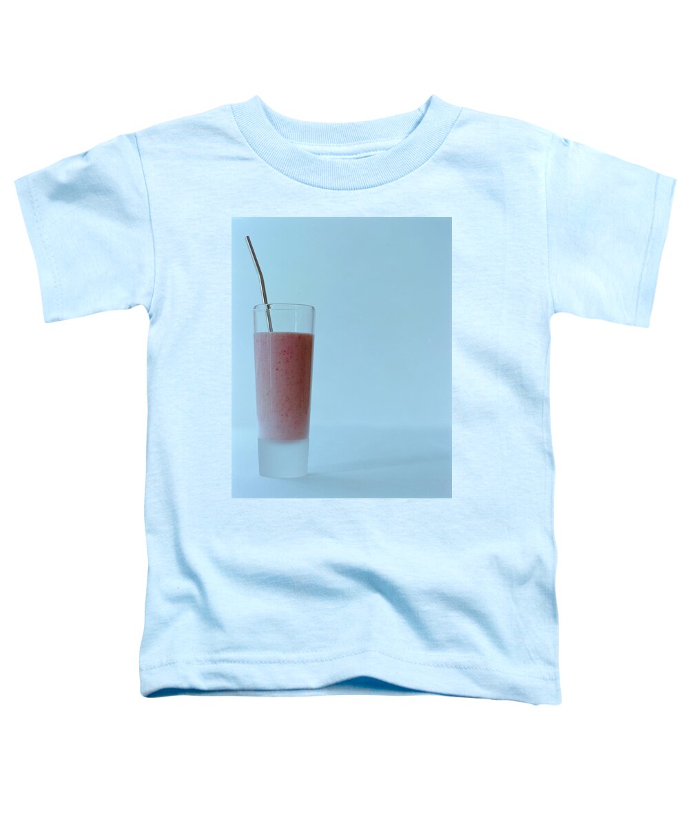 Beverage Toddler T-Shirt featuring the photograph A Strawberry Flavored Drink by Romulo Yanes