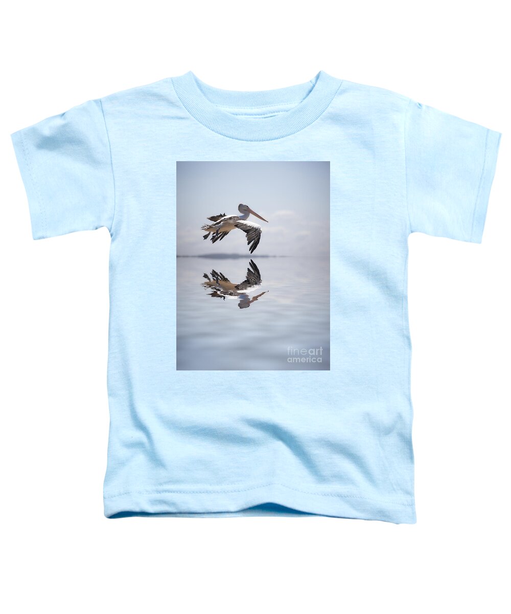 Australian White Pelican Toddler T-Shirt featuring the photograph Pelican in flight by Sheila Smart Fine Art Photography