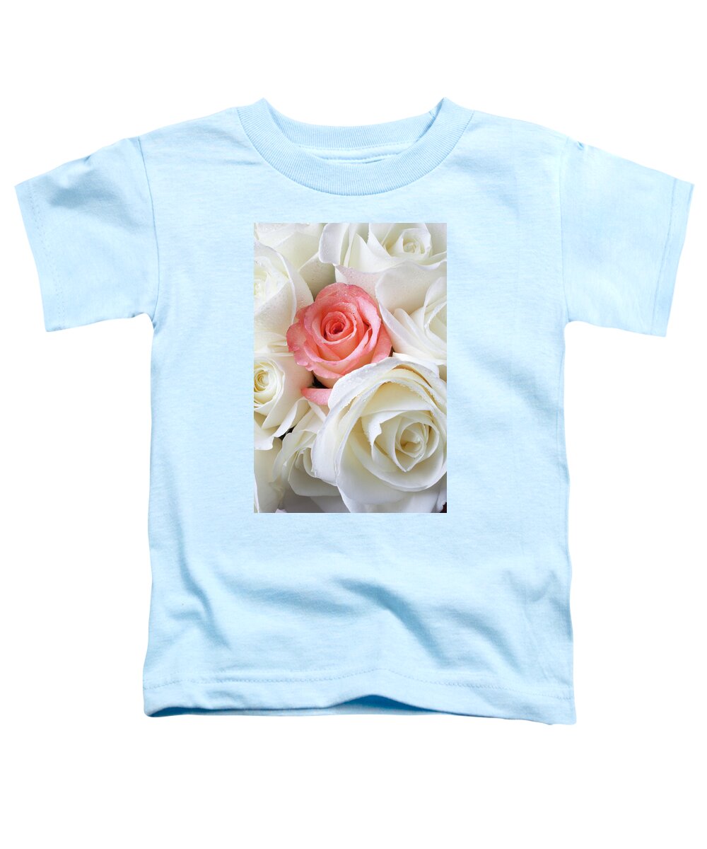 Pink Rose White Roses Toddler T-Shirt featuring the photograph Pink rose among white roses by Garry Gay