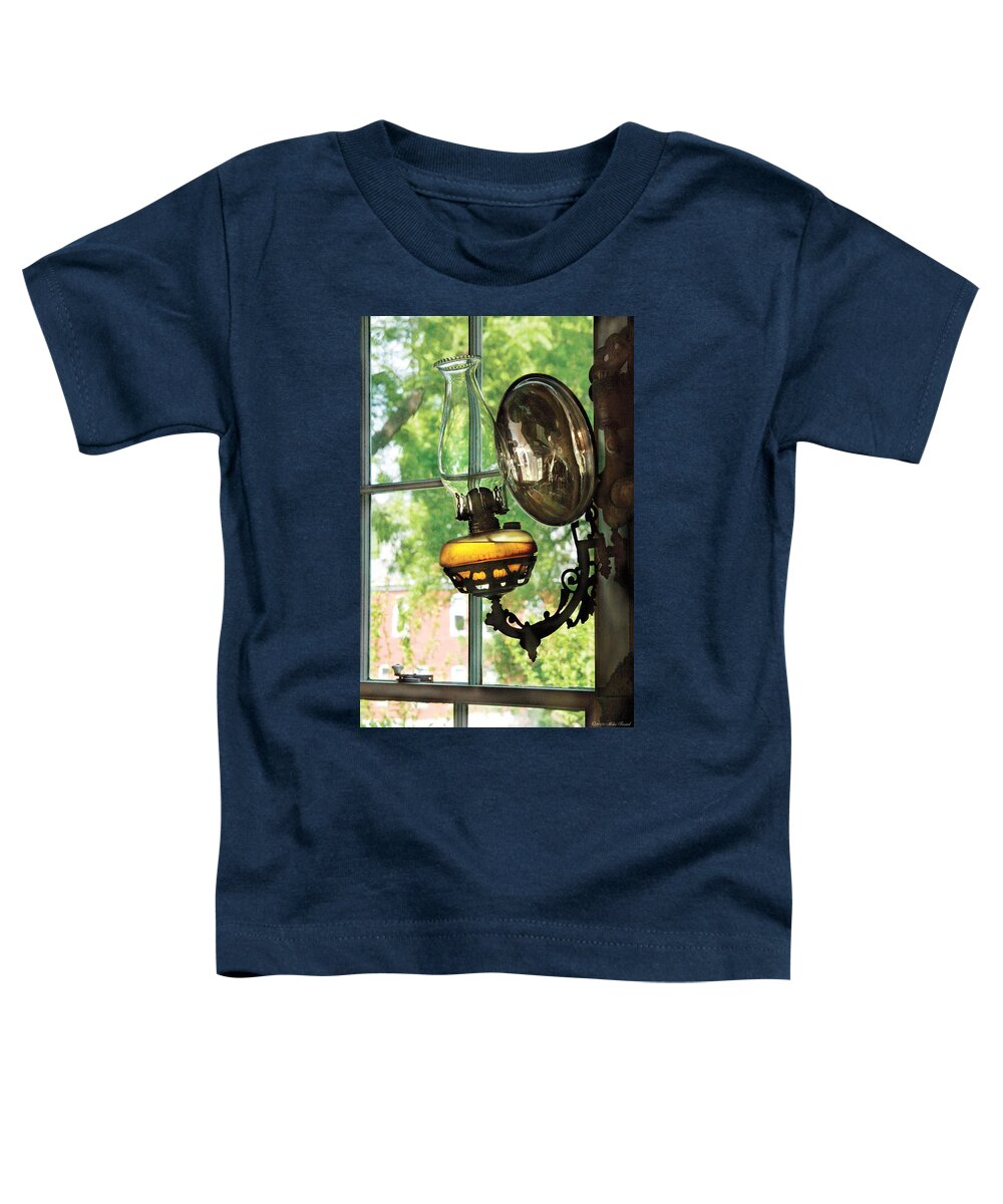 Savad Toddler T-Shirt featuring the photograph Furniture - Lamp - An oil lantern by Mike Savad