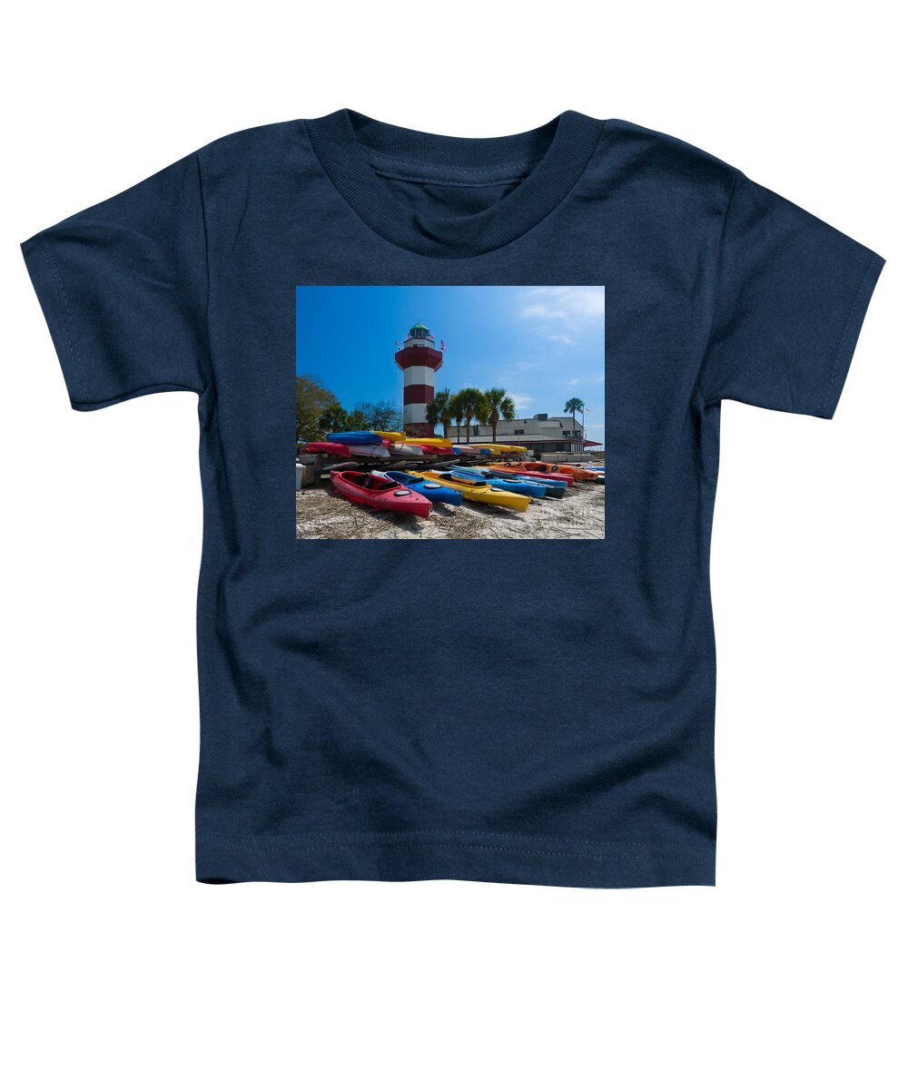 Lighthouse Toddler T-Shirt featuring the photograph The famous lighthouse at Harbourtown on Hilton Head Island by Louise Heusinkveld