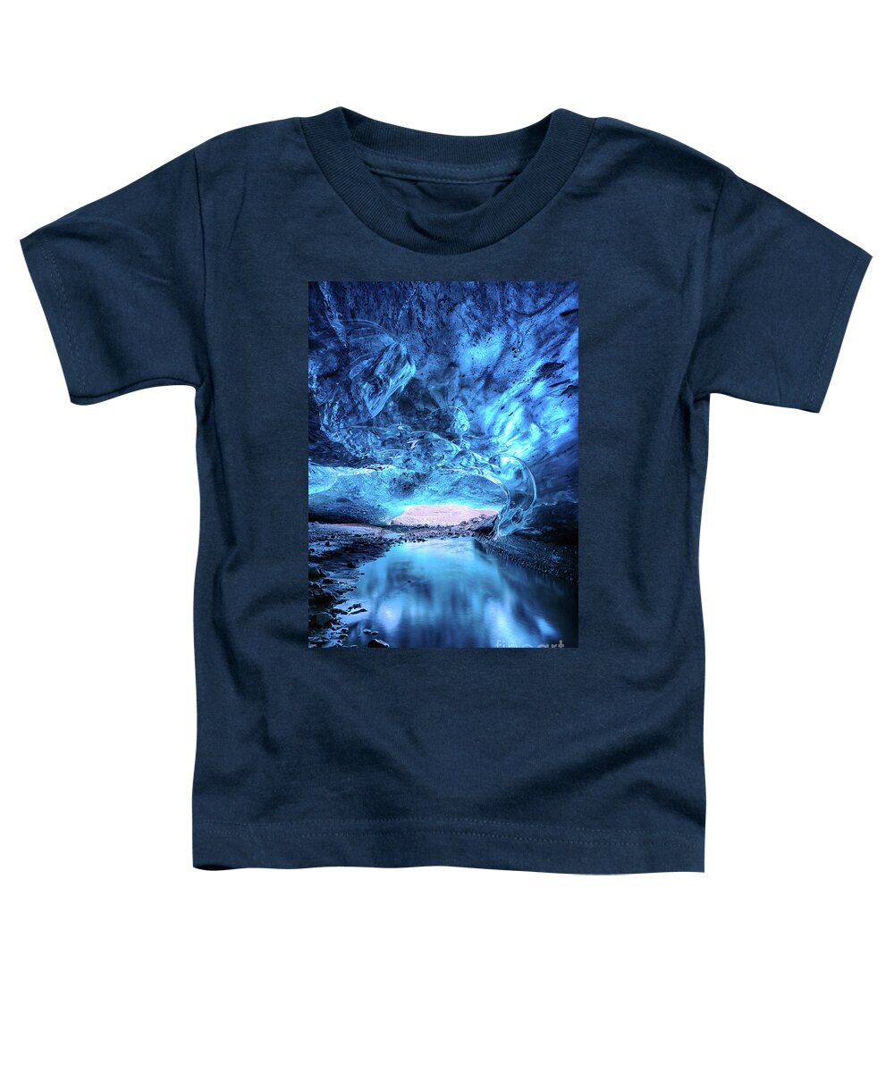 Iceland Toddler T-Shirt featuring the photograph Glacial river flows through a blue ice cave. Part of the Vatnajo by Jane Rix