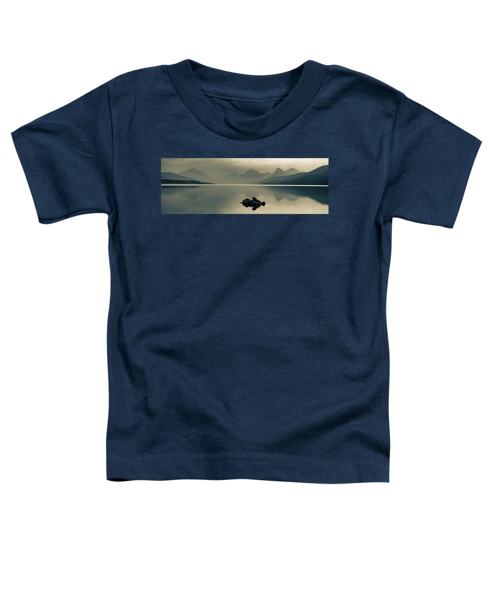 Glacier Park Toddler T-Shirt featuring the photograph Hazy Mountain Landscape Panorama Over Lake McDonald In Sepia by Gregory Ballos