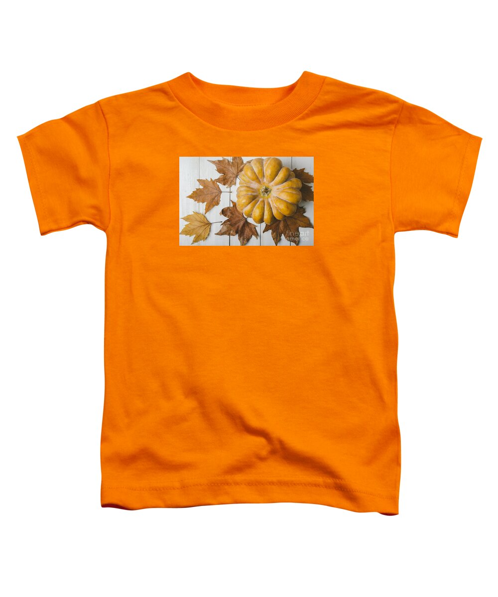 Pumpkin Toddler T-Shirt featuring the photograph Pumkin and maple leaves by Jelena Jovanovic