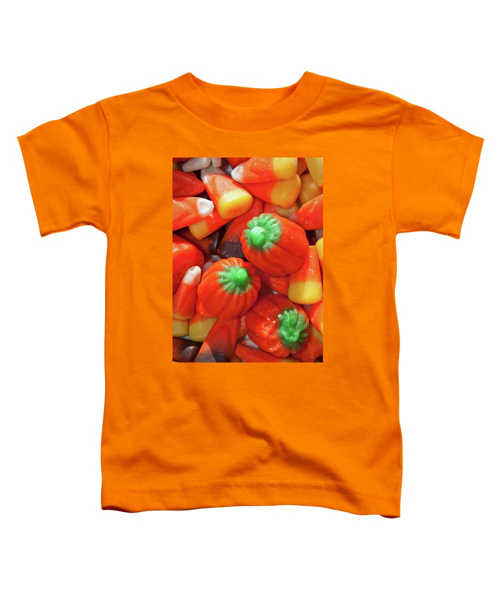 Halloween Toddler T-Shirt featuring the photograph Pumpkins and Candy Corn by Cathy Mahnke