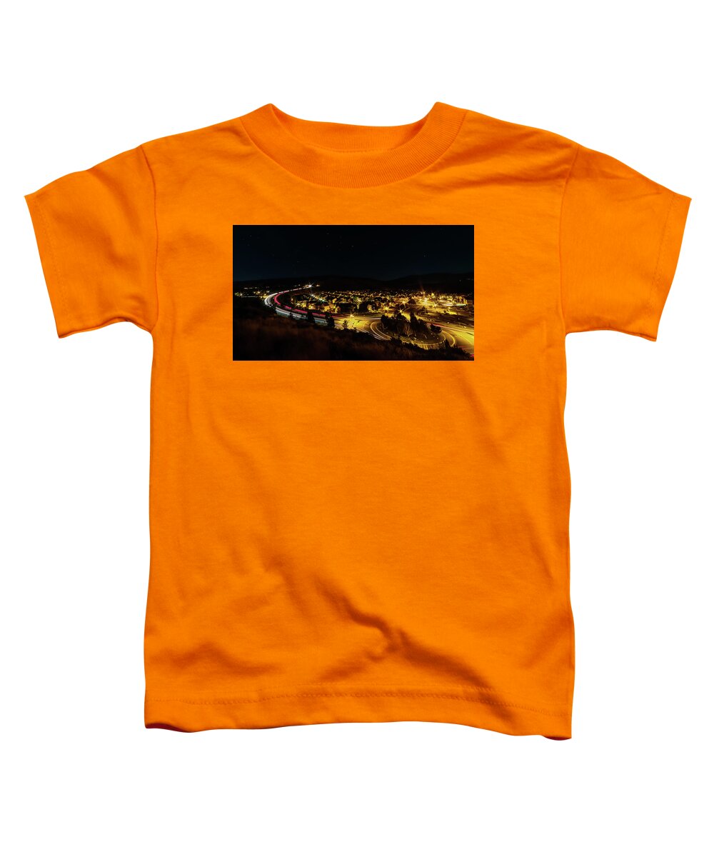Reno Toddler T-Shirt featuring the photograph Roundabout Number Two, Village at Somersett, Reno, Nevada on a Summer Night with Light Trails by Brian Ball