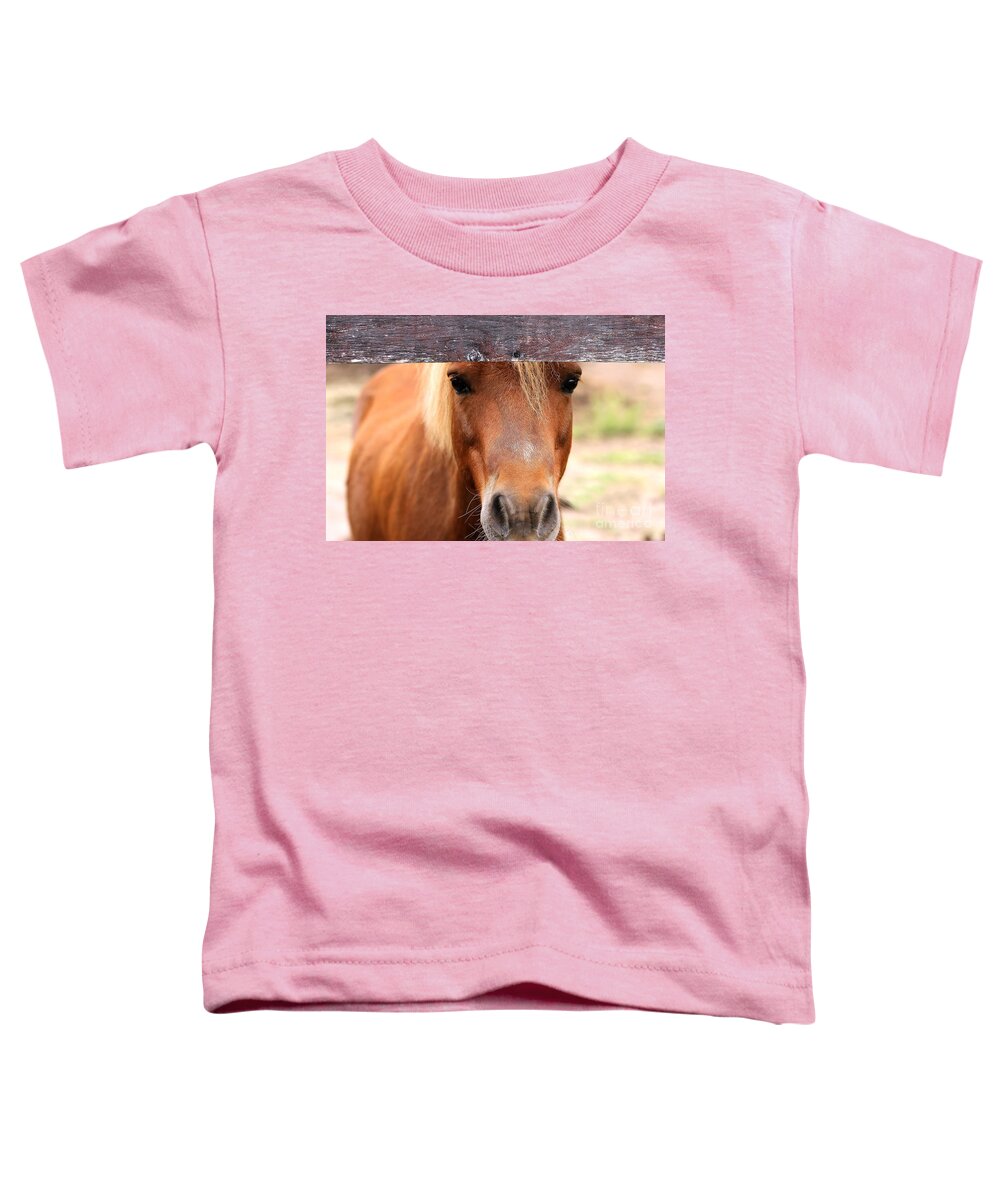 Pony Toddler T-Shirt featuring the photograph Peaking Pony by Janice Byer