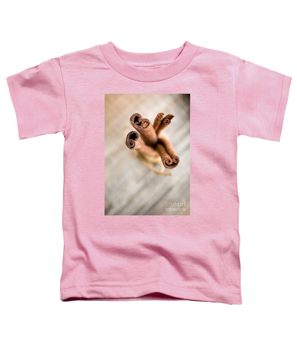 Aromatic Toddler T-Shirt featuring the photograph Cinnamon sticks #1 by Kati Finell