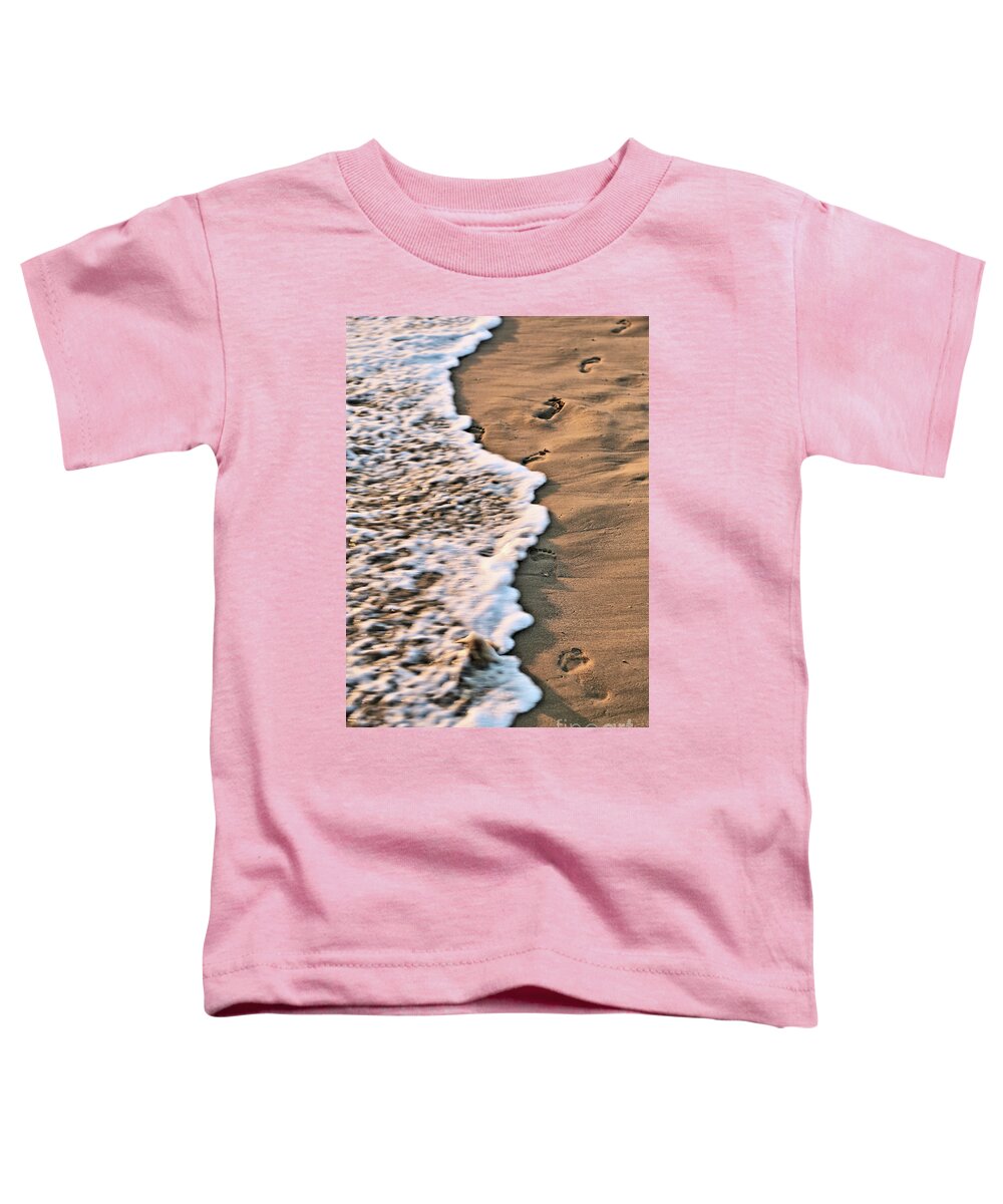 Footprints Toddler T-Shirt featuring the photograph Footprints in the Sand by Vivian Krug Cotton