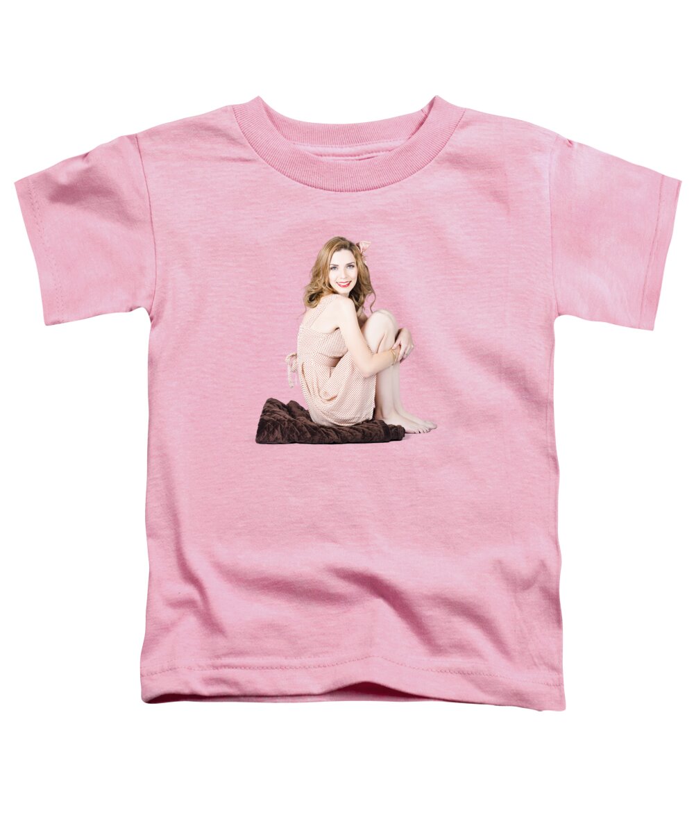 Beauty Toddler T-Shirt featuring the photograph Isolated pinup girl sitting on soft blanket by Jorgo Photography