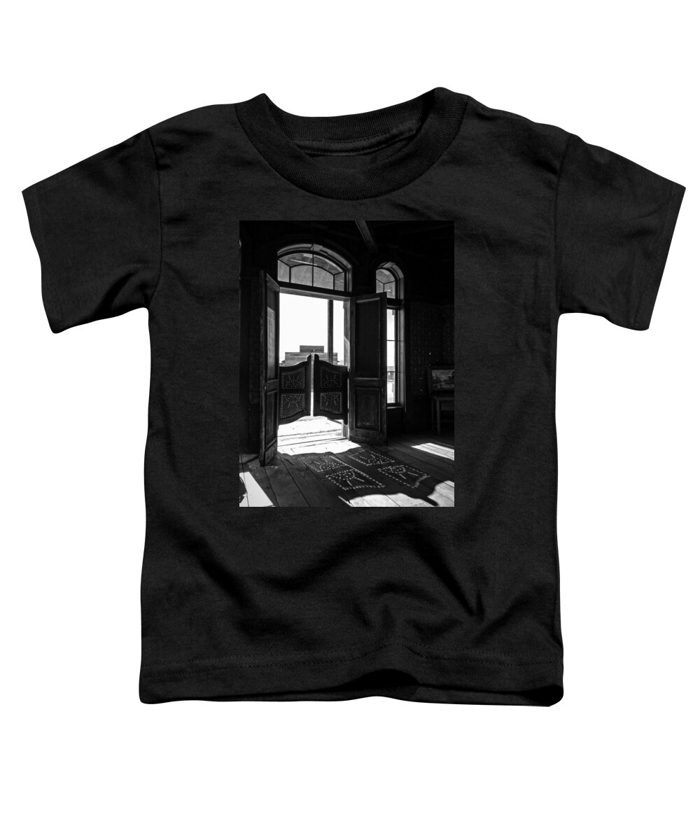 Lucinda Walter Toddler T-Shirt featuring the photograph Swinging Doors #1 by Lucinda Walter