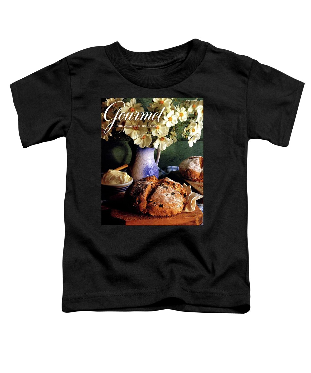 Food Toddler T-Shirt featuring the photograph A Gourmet Cover Of Bread And Flowers by Romulo Yanes