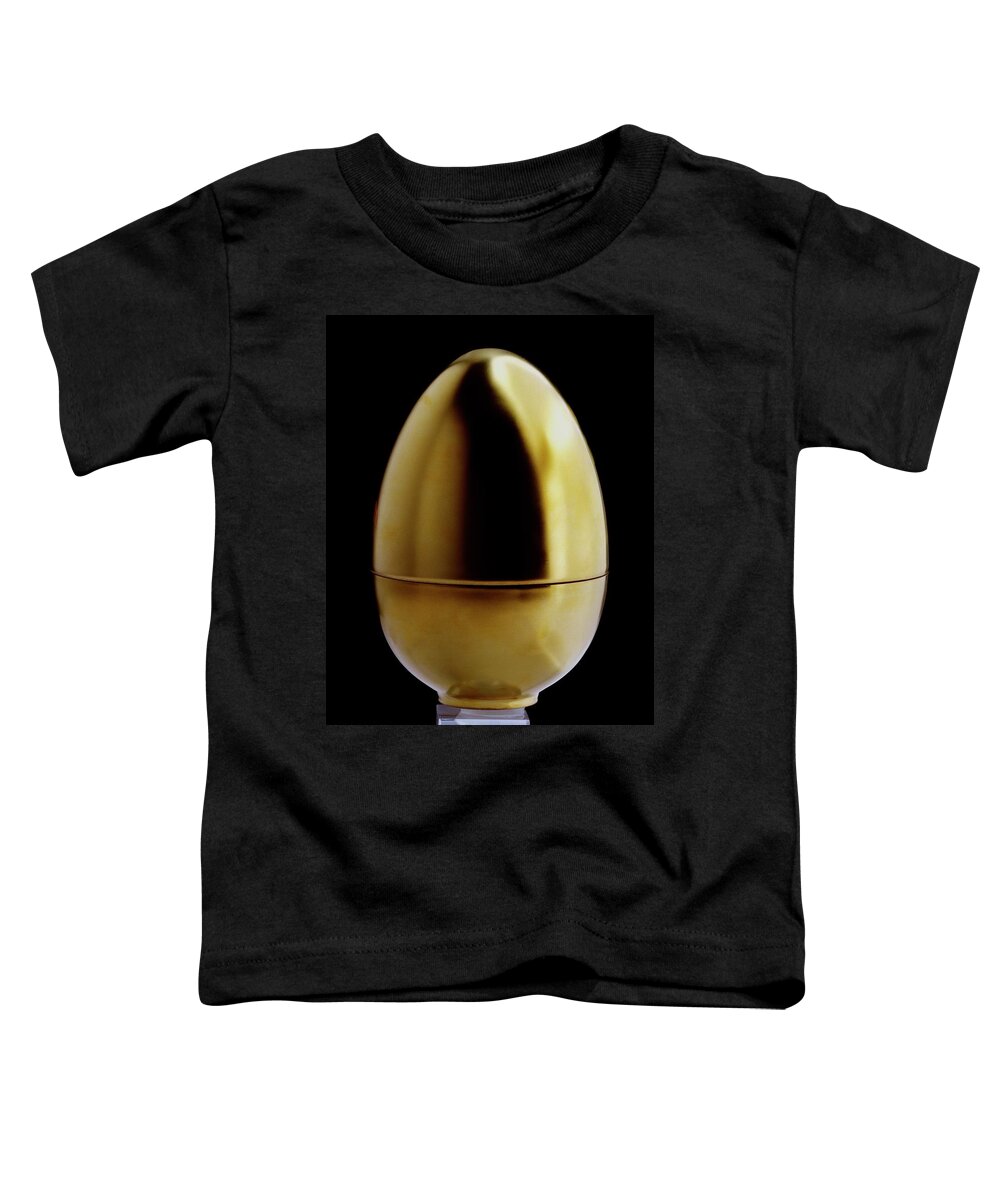 Kitchen Toddler T-Shirt featuring the photograph A Matroschka Egg by Romulo Yanes