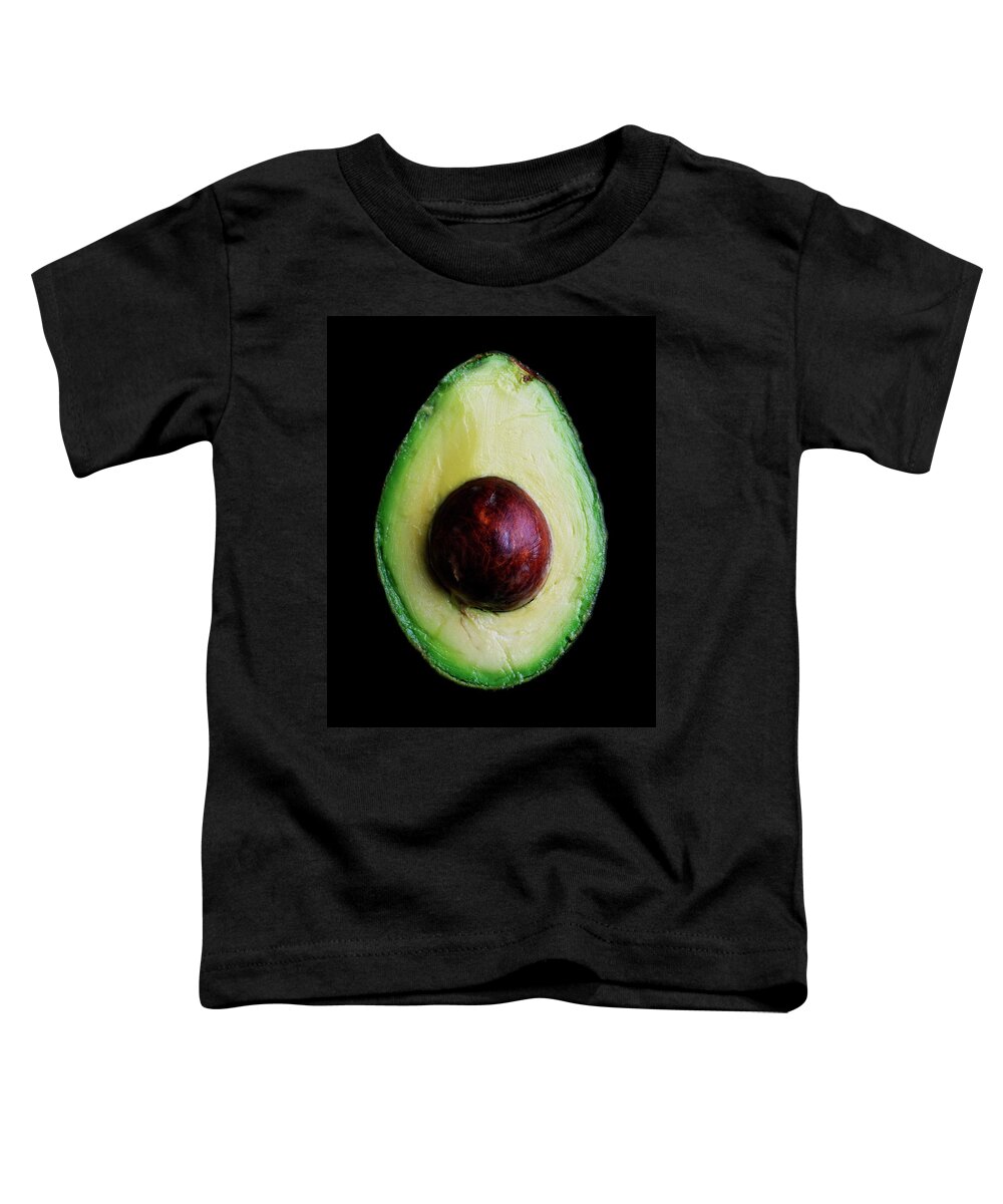 Fruits Toddler T-Shirt featuring the photograph An Avocado by Romulo Yanes