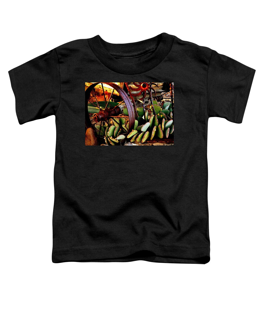 Wagon Wheel Toddler T-Shirt featuring the photograph Caught in a Cactus Patch-SOLD by Antonia Citrino