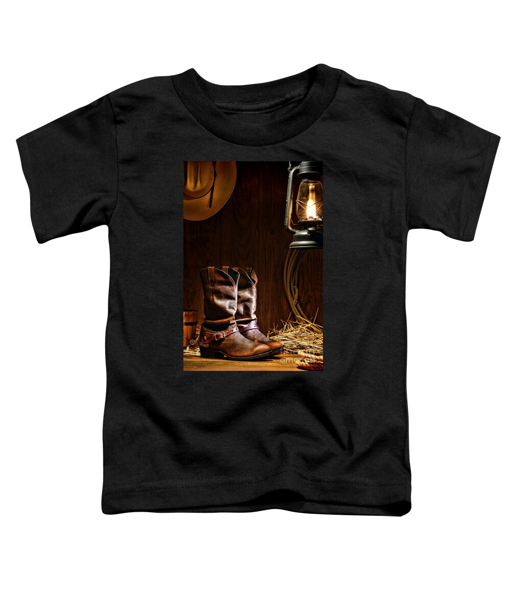 Western Toddler T-Shirt featuring the photograph Cowboy Boots at the Ranch by Olivier Le Queinec