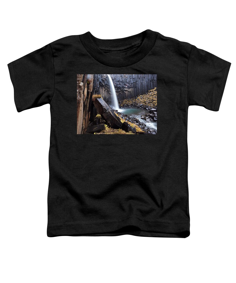 Waterfall Toddler T-Shirt featuring the photograph Flowing through basalt rocks II by Matteo Colombo