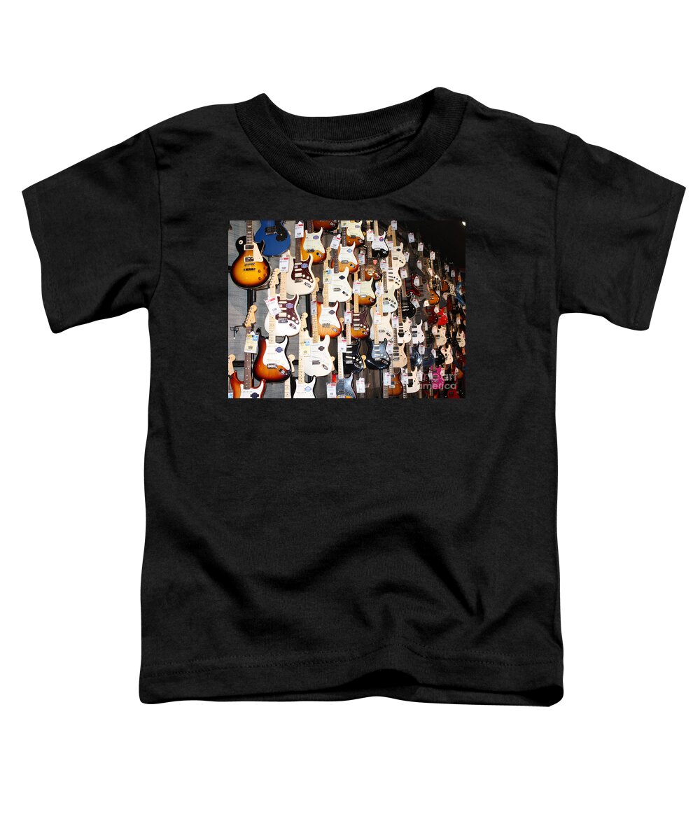 Guitar Wall Of Fame Toddler T-Shirt featuring the photograph Guitar Wall of Fame by John Telfer