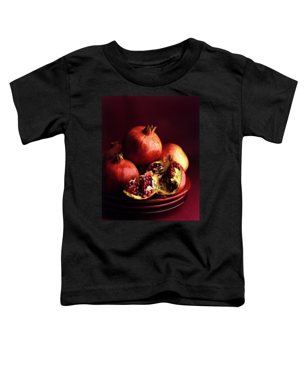 Fruits Toddler T-Shirt featuring the photograph Pomegranates by Romulo Yanes