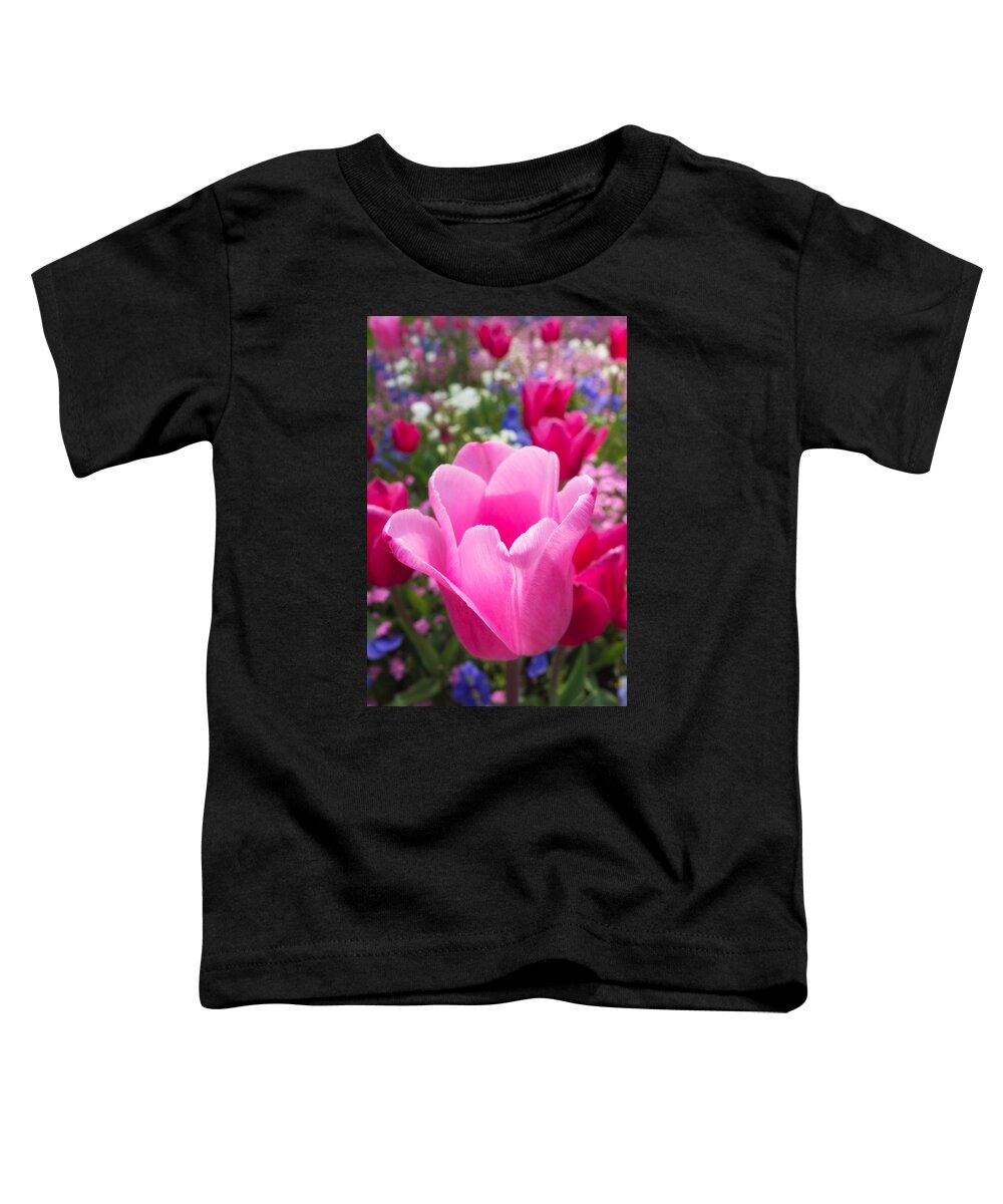 Tulip Toddler T-Shirt featuring the photograph Pretty pink tulip and field with flowers and tulips by Matthias Hauser