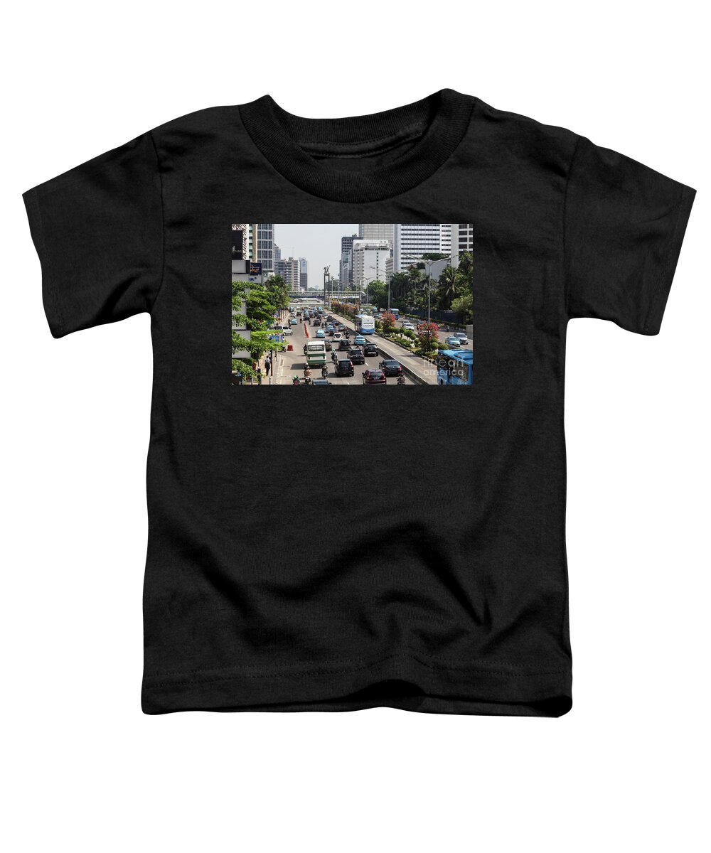 Capital Cities Toddler T-Shirt featuring the photograph Traffic along Sudirman avenue in Jakarta, Indonesia capital city #4 by Didier Marti