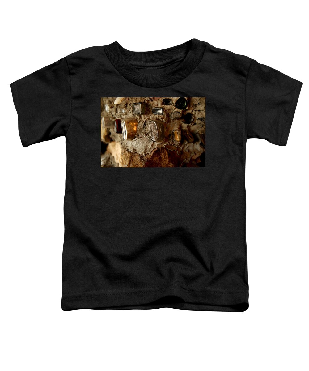 Art Toddler T-Shirt featuring the photograph A wall of bottles by Jeff Swan
