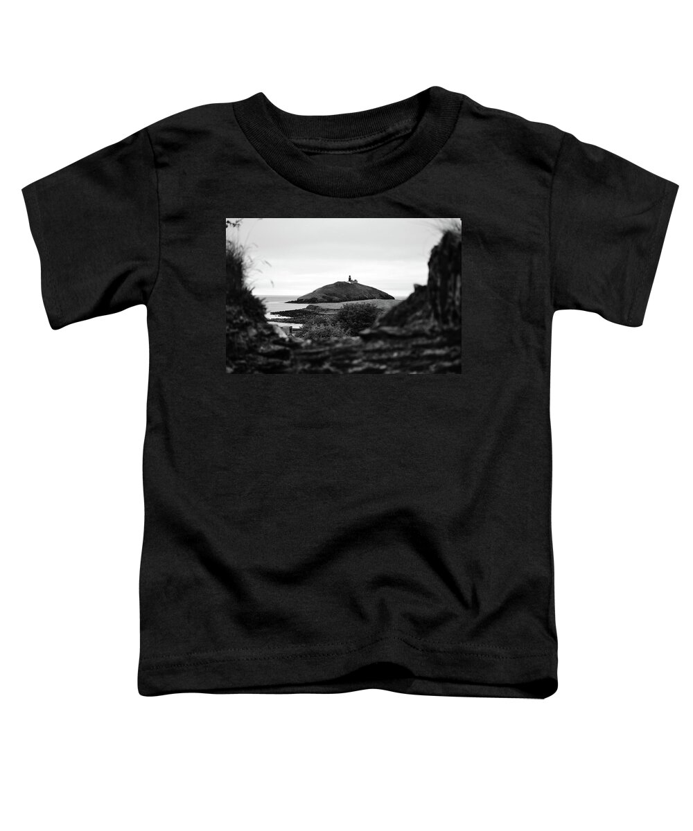Ballycotton Toddler T-Shirt featuring the photograph Ballycotton Ireland Lighthouse through Village Stone Wall County Cork Black and White by Shawn O'Brien
