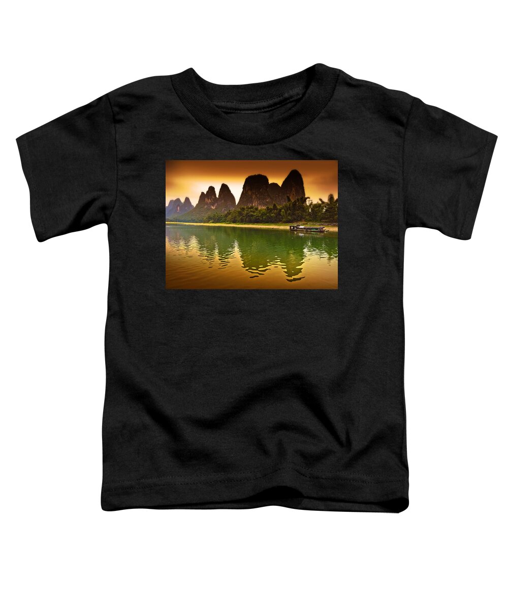 Sunset Toddler T-Shirt featuring the photograph Boat Breaks Tranquil Evening Reflection-China Guilin scenery Lijiang River in Yangshuo by Artto Pan