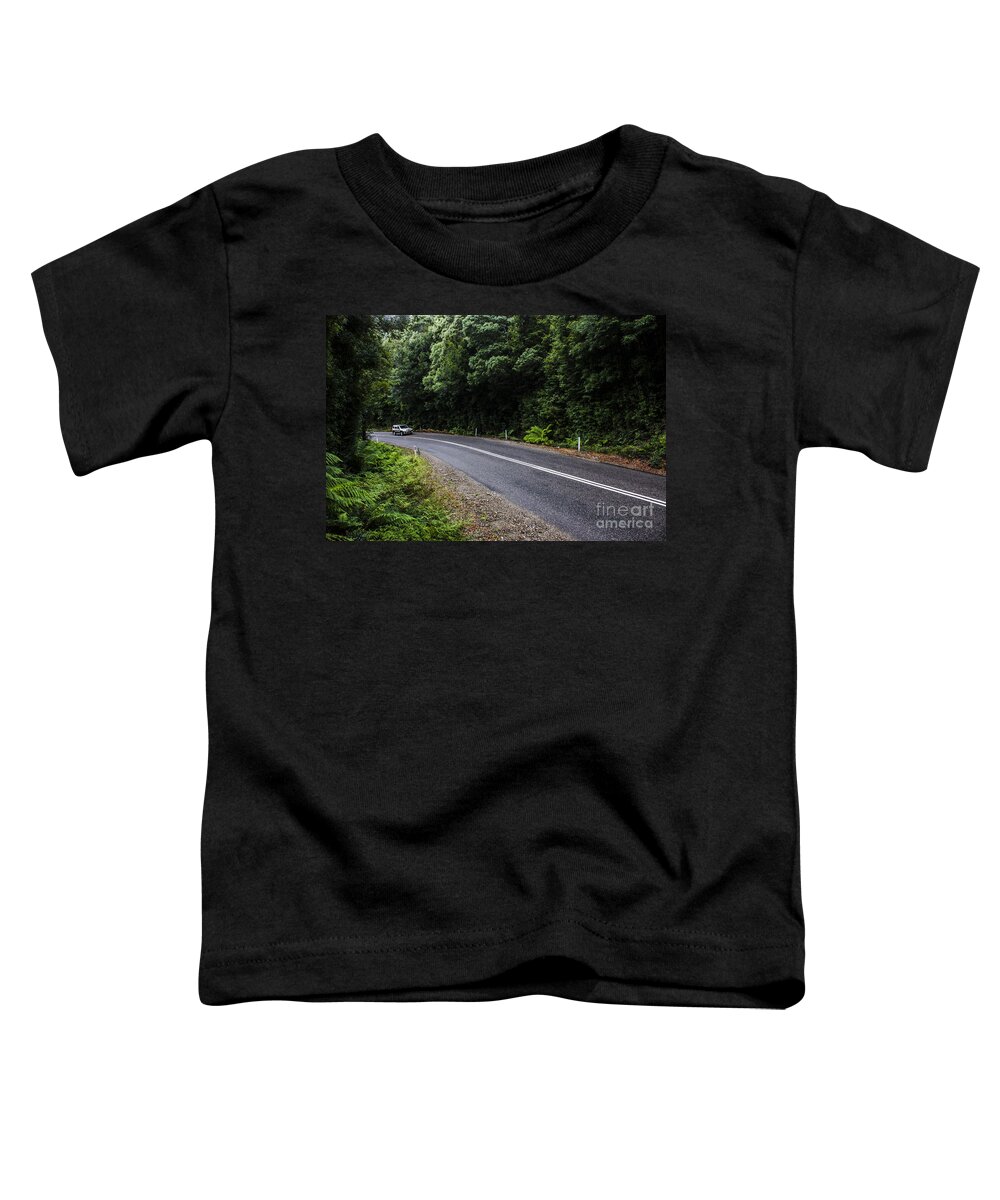 Car Toddler T-Shirt featuring the photograph Car travelling through rainforest in West Tasmania by Jorgo Photography