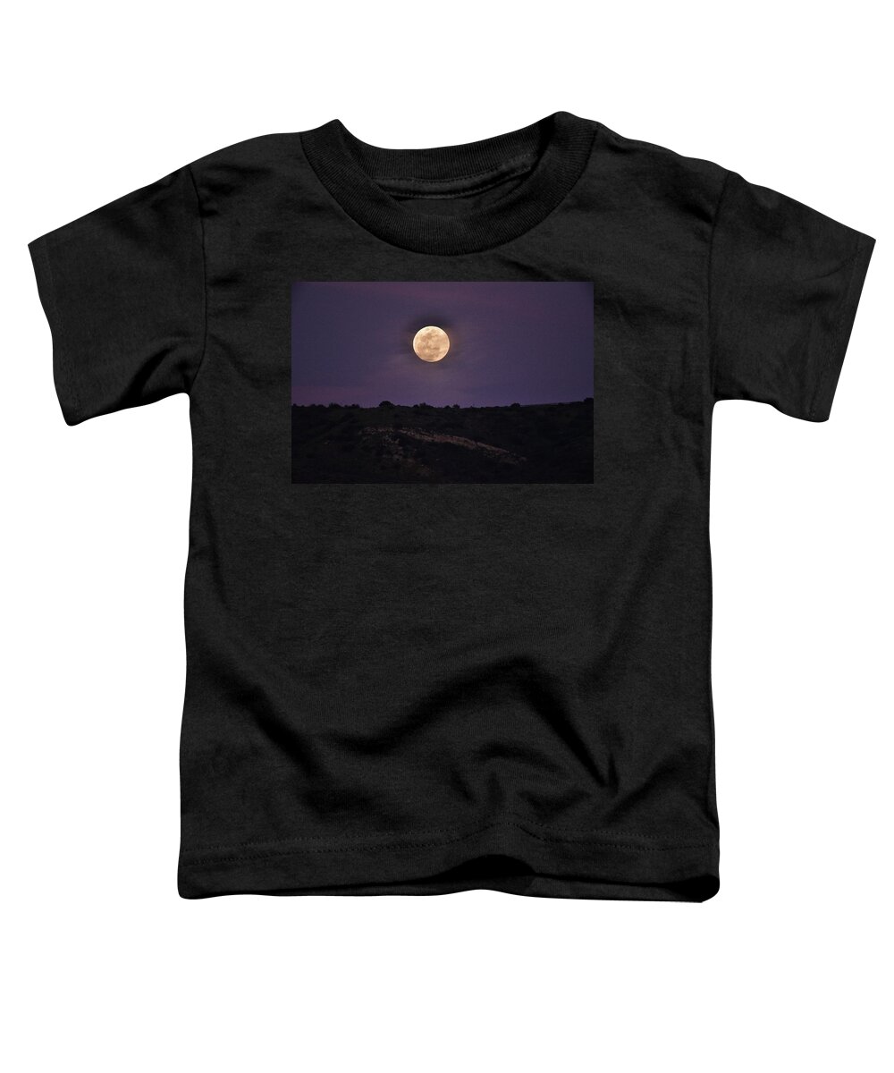 Linda Brody Toddler T-Shirt featuring the photograph Full Moon Rising Over Silhouetted Hillside with Purple Sky 3 by Linda Brody