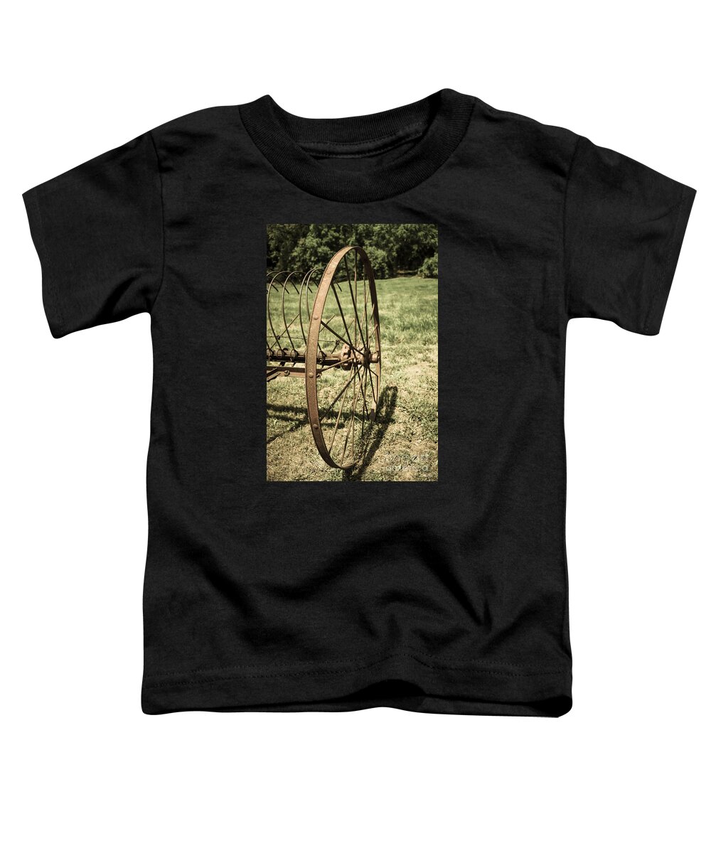 Vintage Toddler T-Shirt featuring the photograph Hay Rake Wheel Aged by Jennifer White