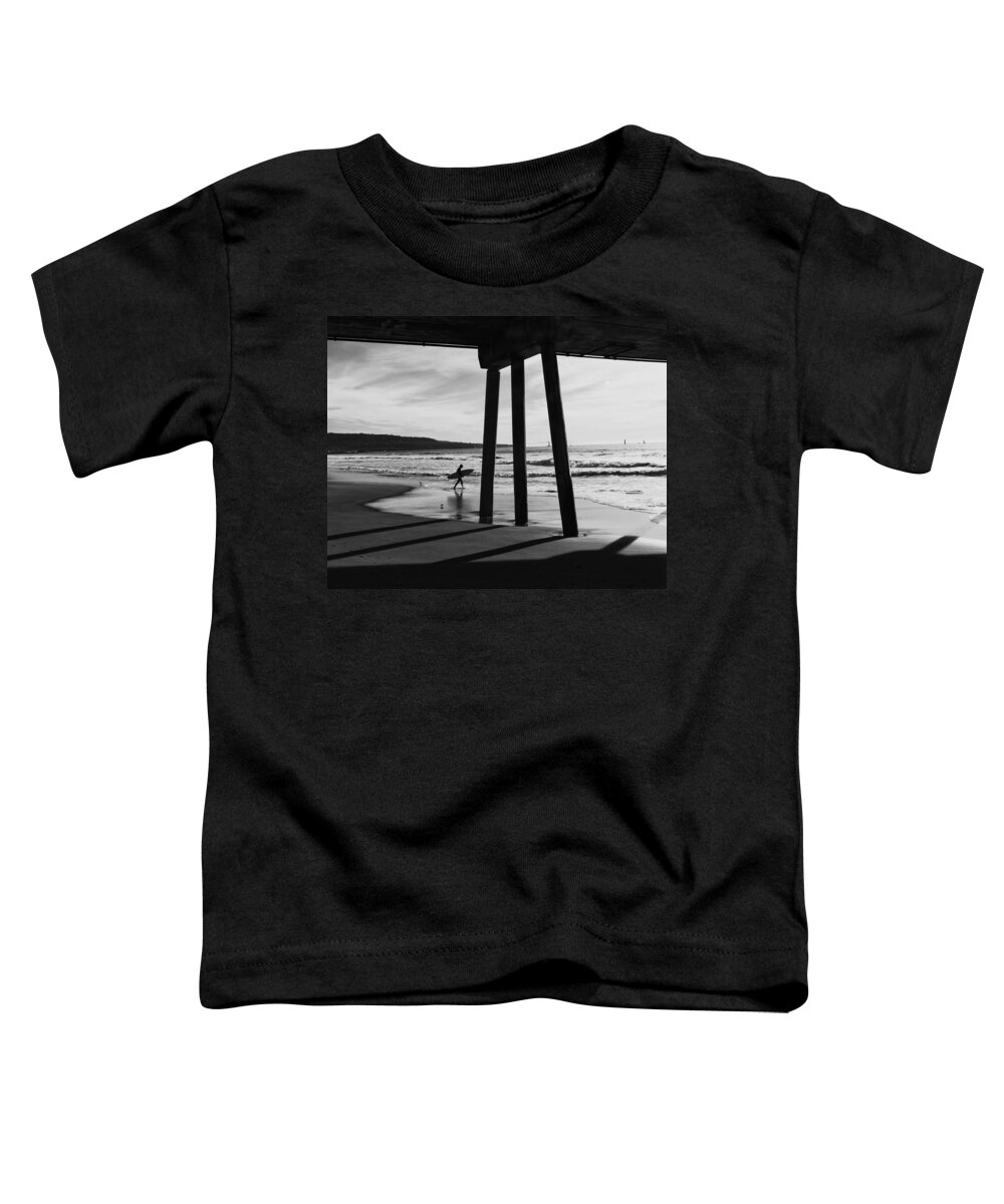 Pier Toddler T-Shirt featuring the photograph Hermosa Surfer Under Pier by Michael Hope
