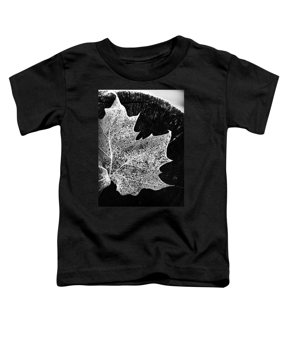 Kelly Hazel Toddler T-Shirt featuring the photograph Leaf on Log in Black and White High Contrast by Kelly Hazel