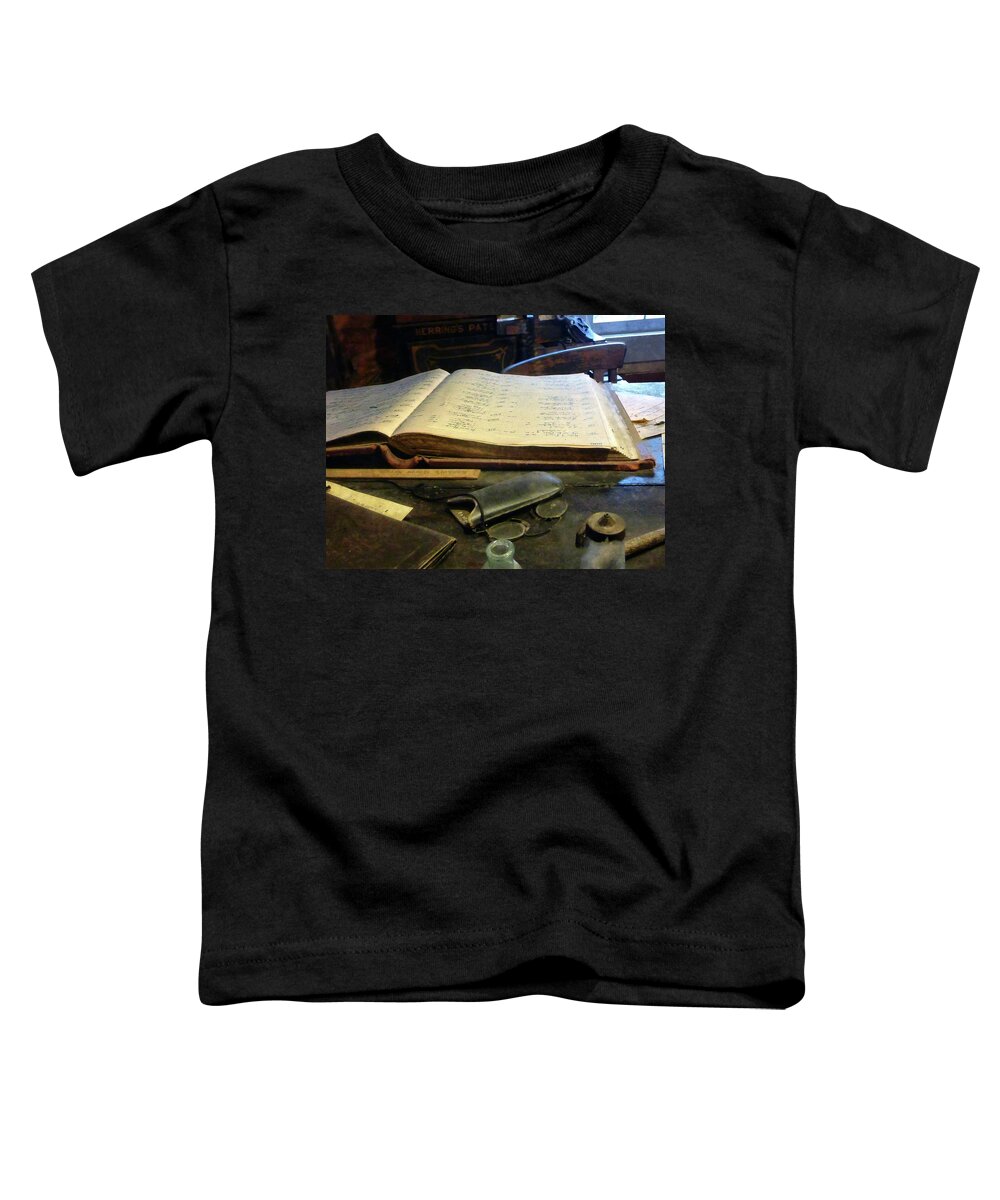 Ledger Toddler T-Shirt featuring the photograph Ledger and Eyeglasses by Susan Savad