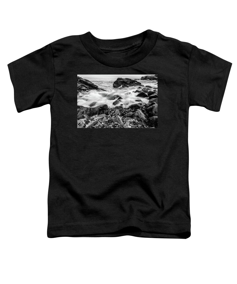 Black And White Toddler T-Shirt featuring the photograph Waves Against a Rocky Shore in BW by Doug Camara